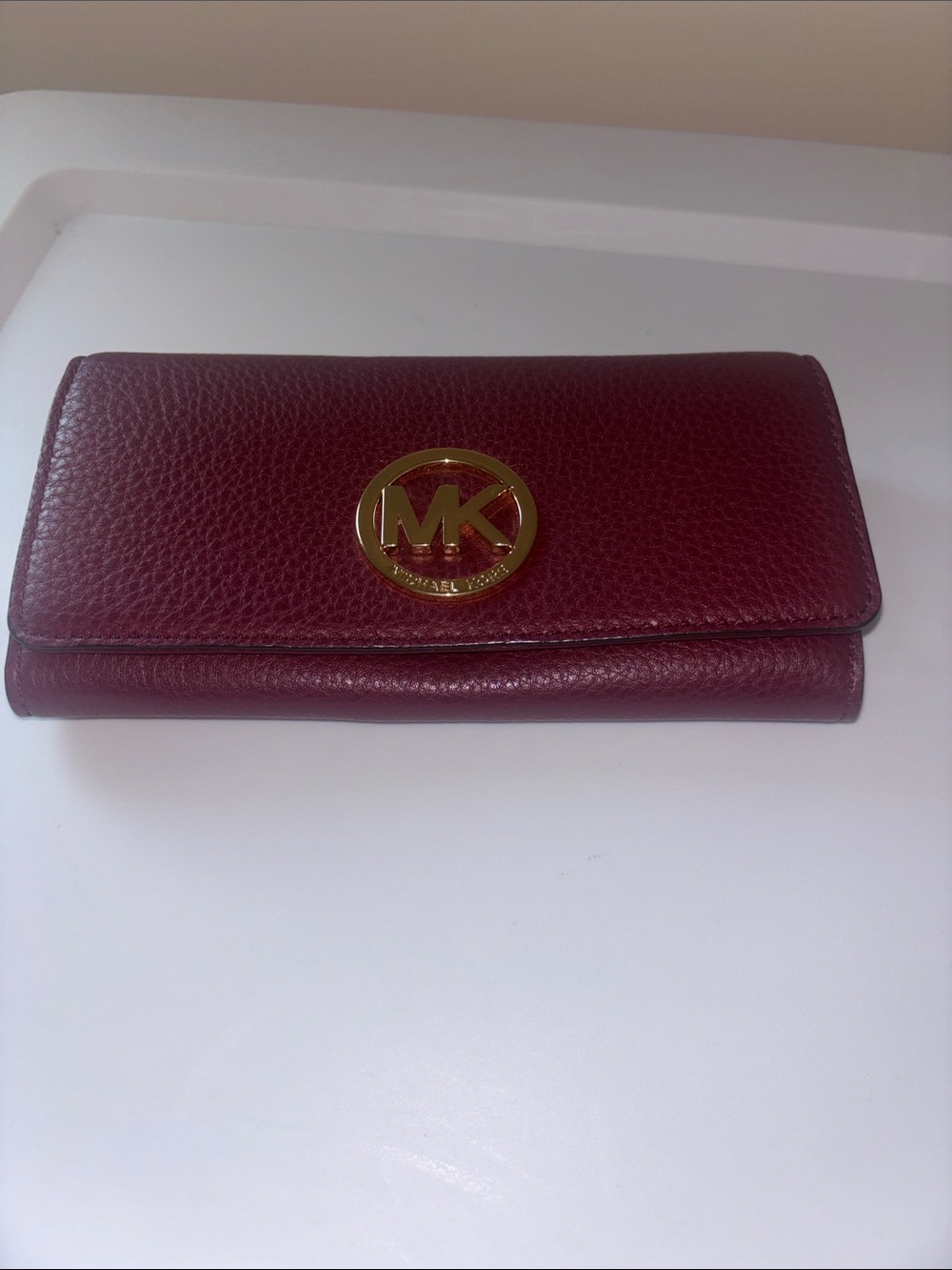 Michael Kors Wine Pebbled Leather Continental Wallet with Gold MK Emblem